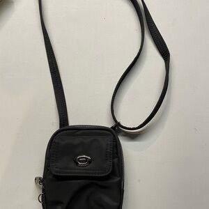 Travelon Black Crossbody Bag w/multiple pockets RFID adjustable mini flashlight